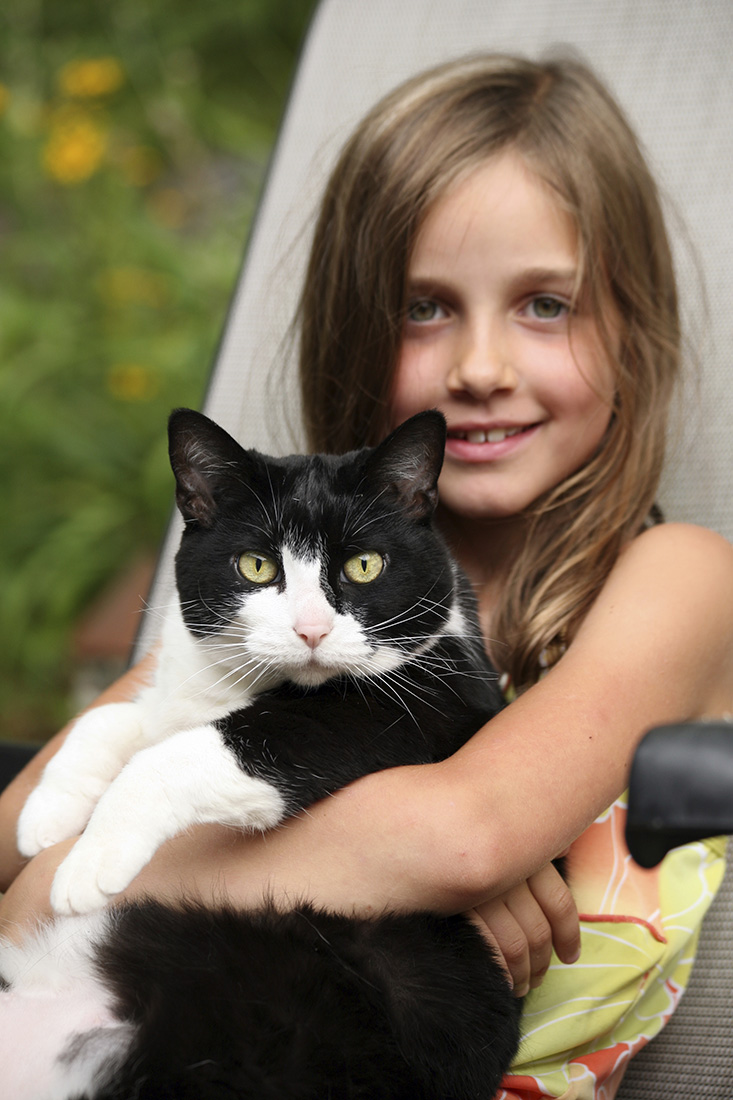 A Girl and Her Cat